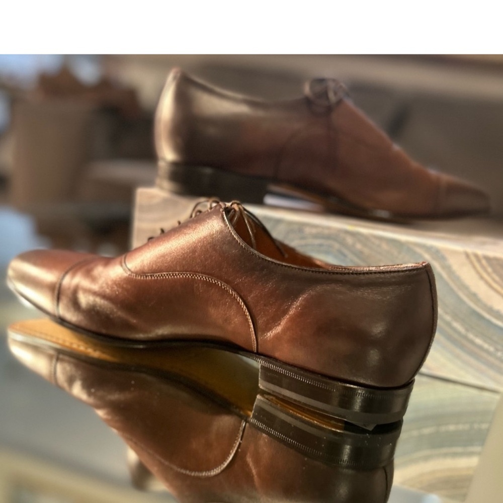 Smart classic wood and leather Italian made shoe.